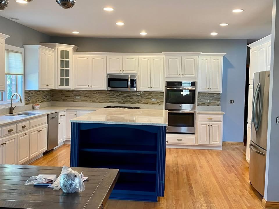 Kitchen after cabinet painting front view